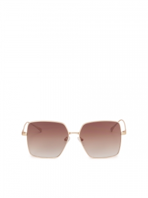 Occhiali da sole eleganti con montatura dorata