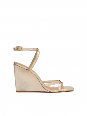 Sandali dorati con plateau