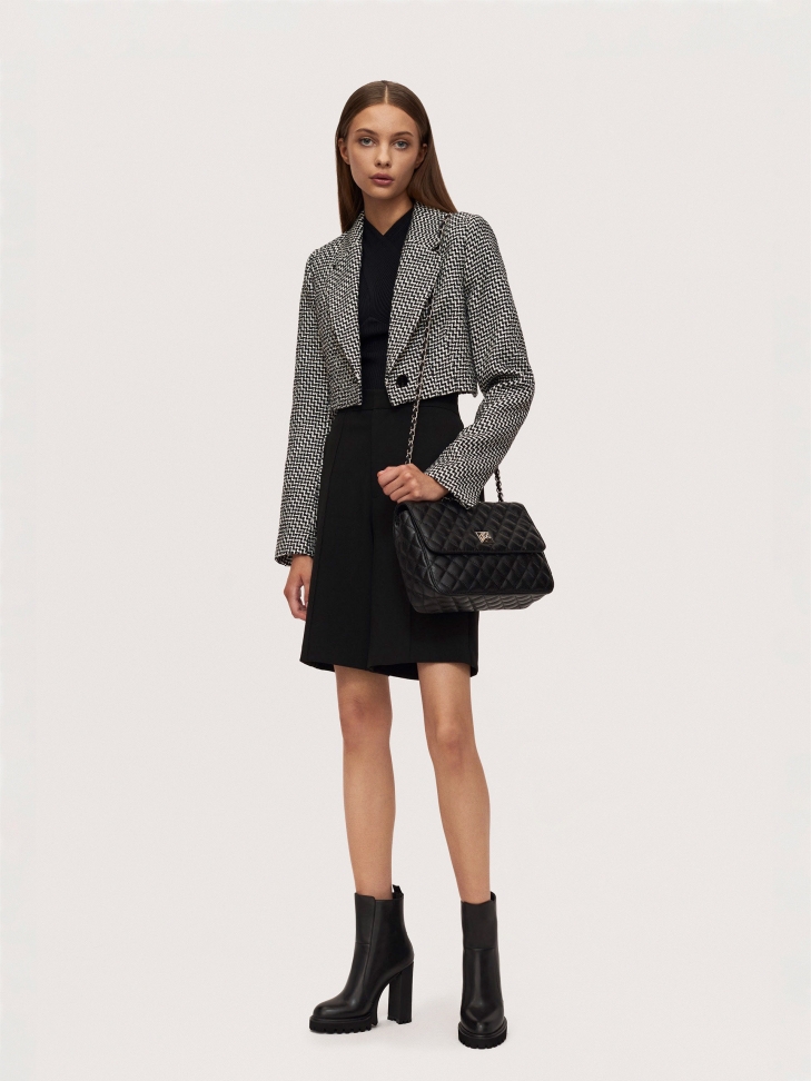 Borsa trapuntata con catena intrecciata a una tracolla in pelle VIDIA