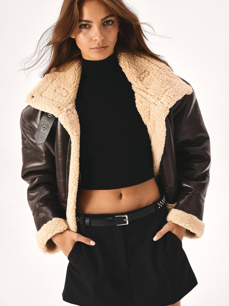 Cintura stretta nera decorata con rivetti d'argento  PERKINS