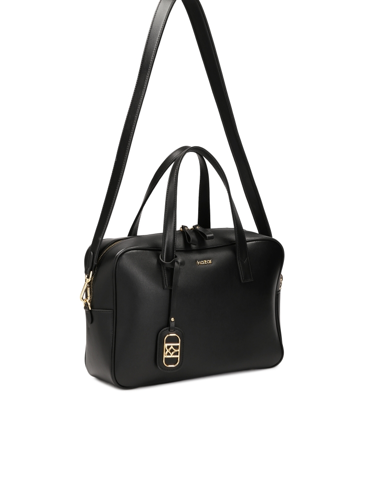 Borsa in pelle dalla forma geometrica SILE