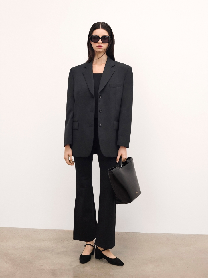 Elegante borsa in pelle nera con logo in oro RILEY