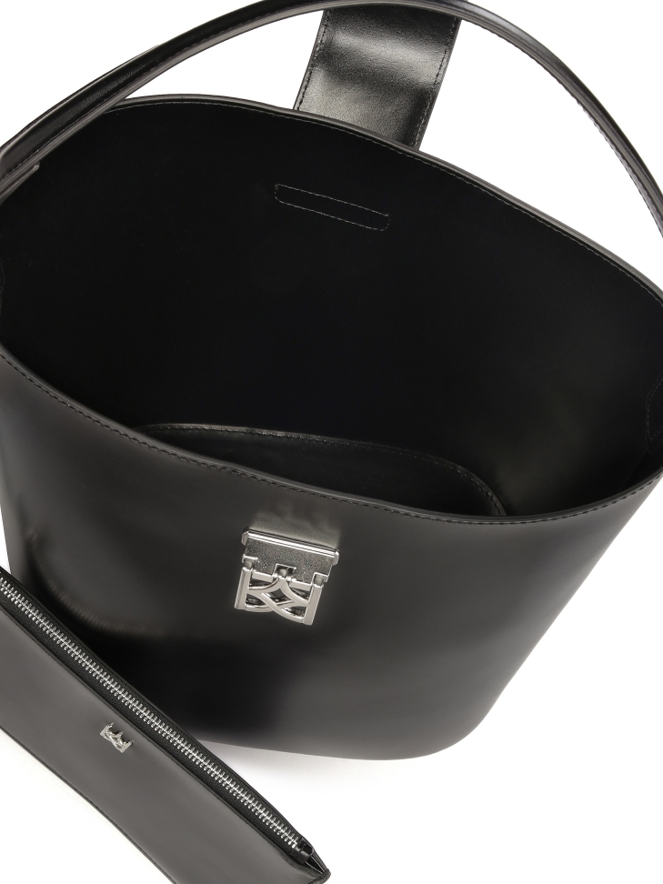 Borsetta nera a struttura rigida con custodia ARTE